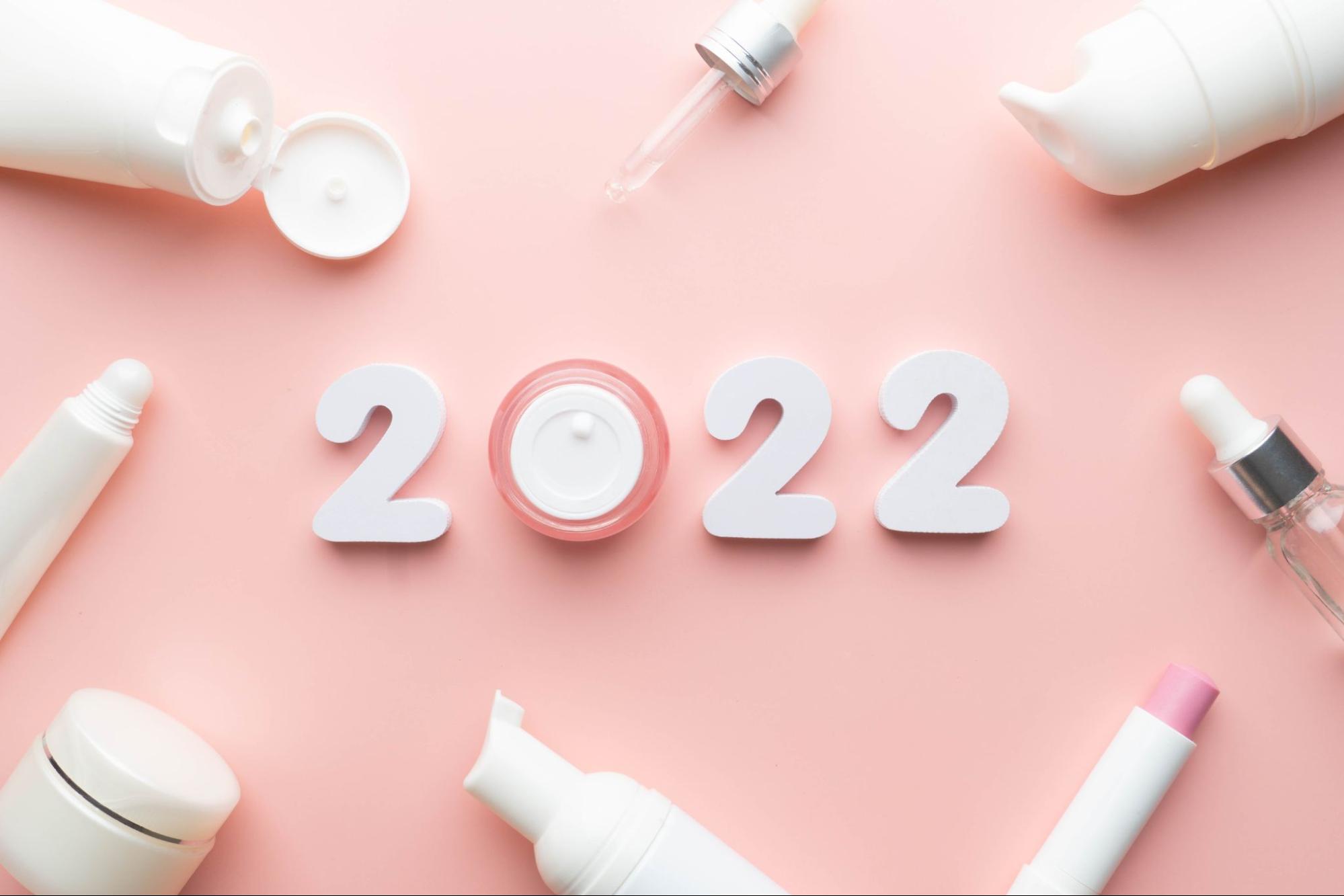 2022 surrounded by beauty products to represent Beauty Trends for 2022