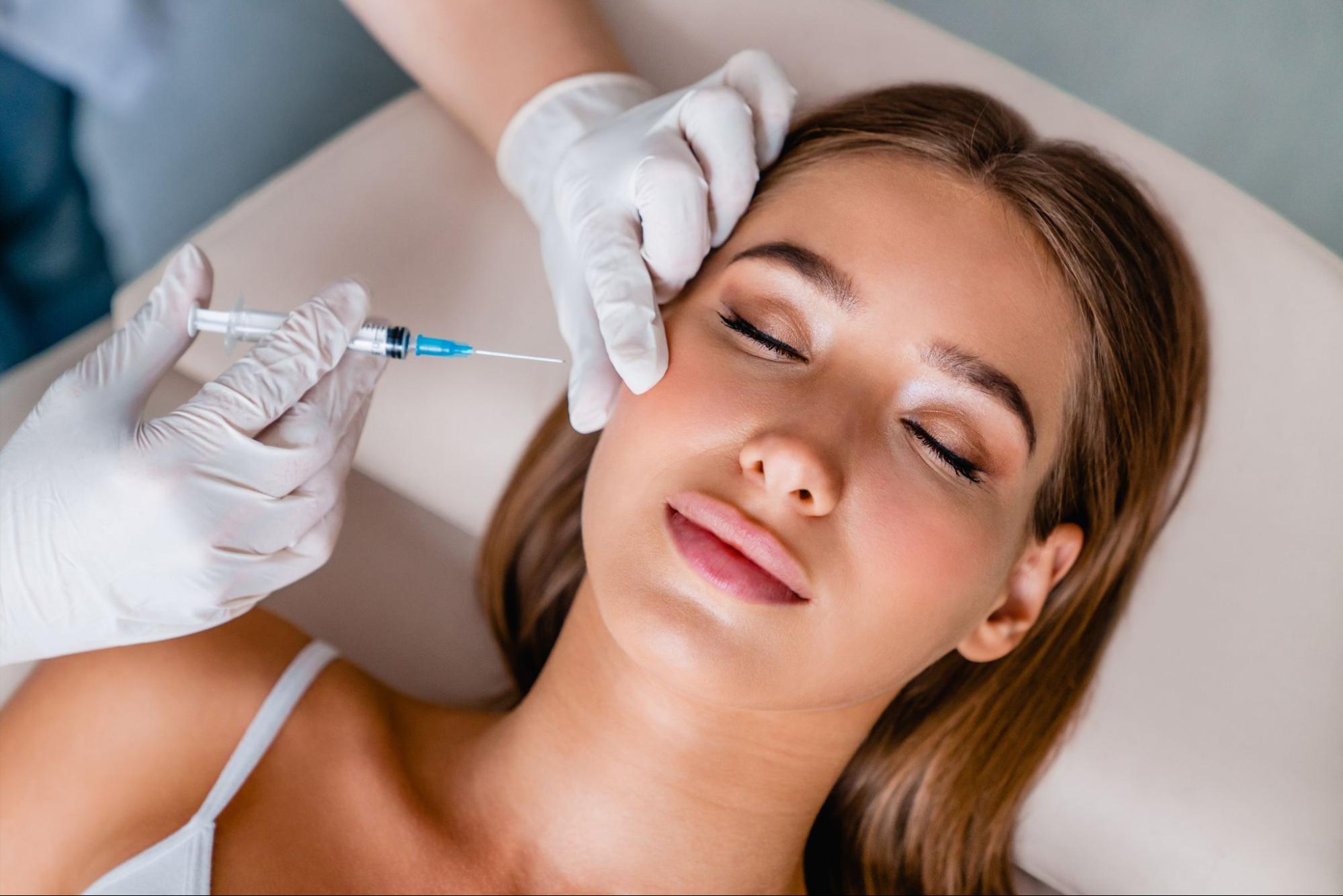 A young woman getting cosmetic injectables as a form of prejuvenation